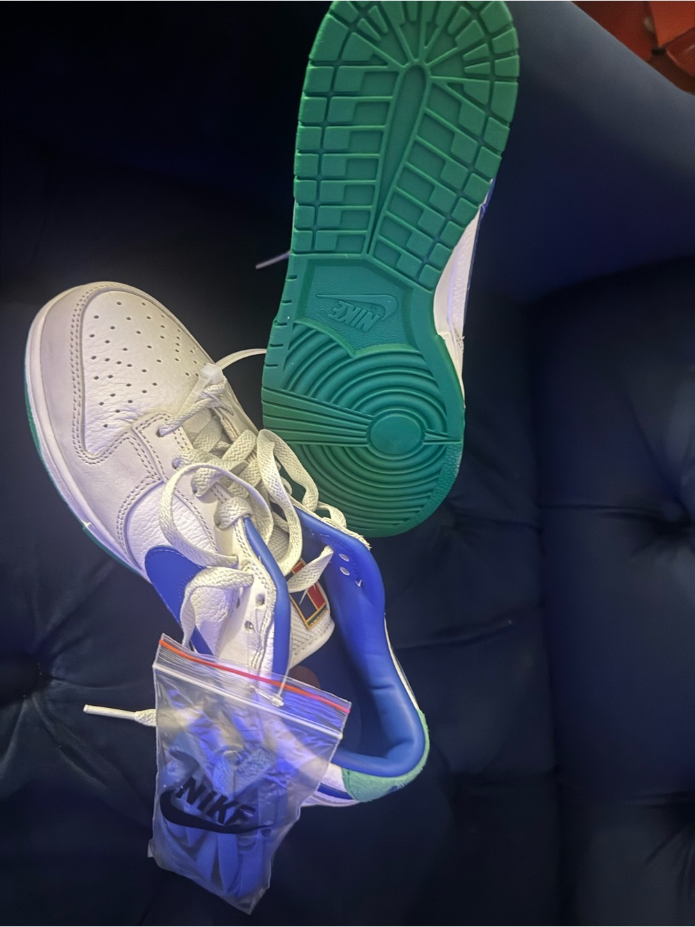 Nike Kids White Sneakers with Teal Soles and Blue Accents